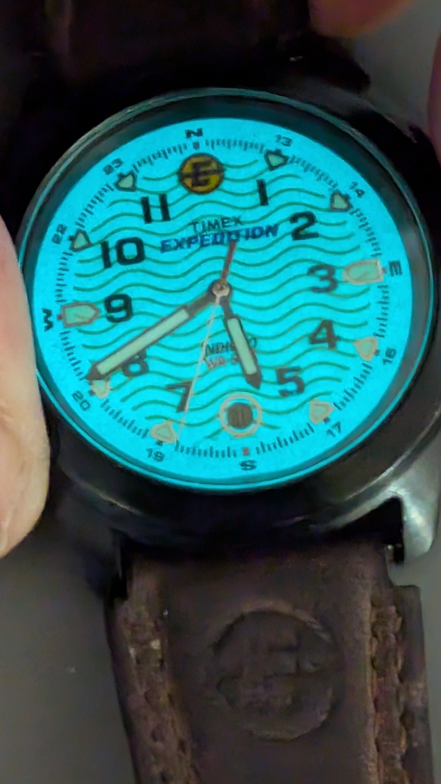 Timex Expedition Indiglo quartz watch with new battery and original leather band. Clean watch that keeps good time.