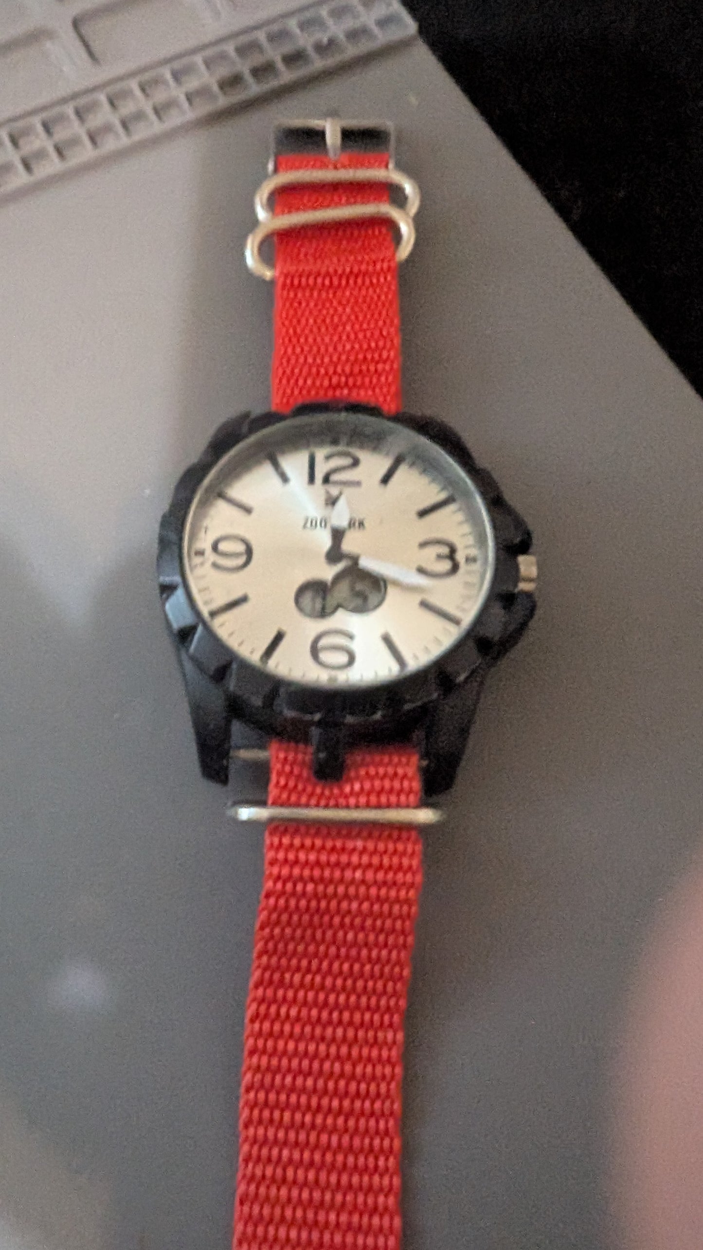 Men's Zoo York Quartz digital and analog readout watch with new batteries that is clean and keeps good time.
