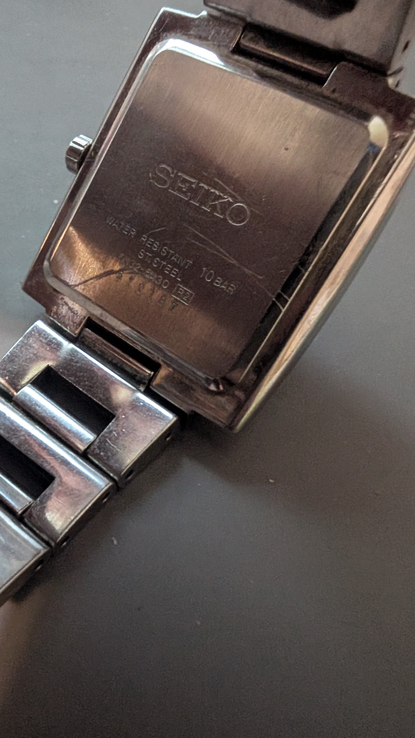 Seiko Spirit tank style quartz watch with new battery and original bracelet. Band. Keeps good time.