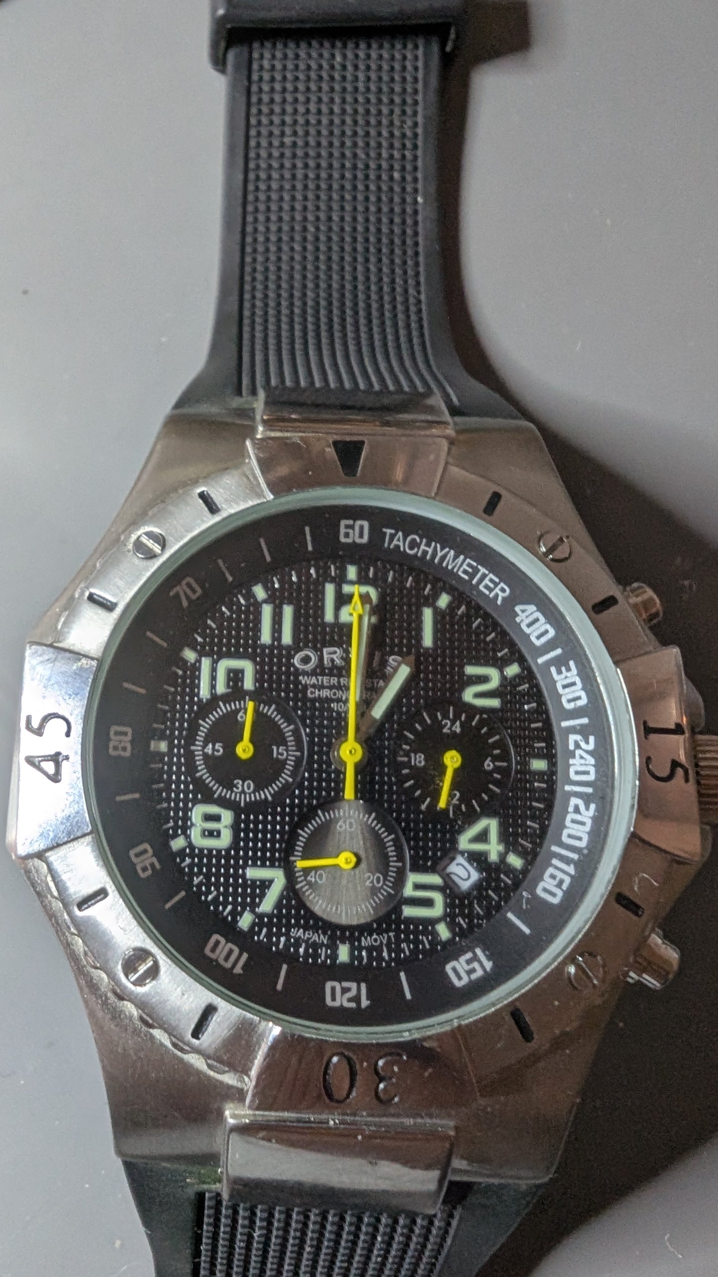 Orvis chronograph diver style watch with silicone diver style band and new battery. Very good condition. Keeps great time.