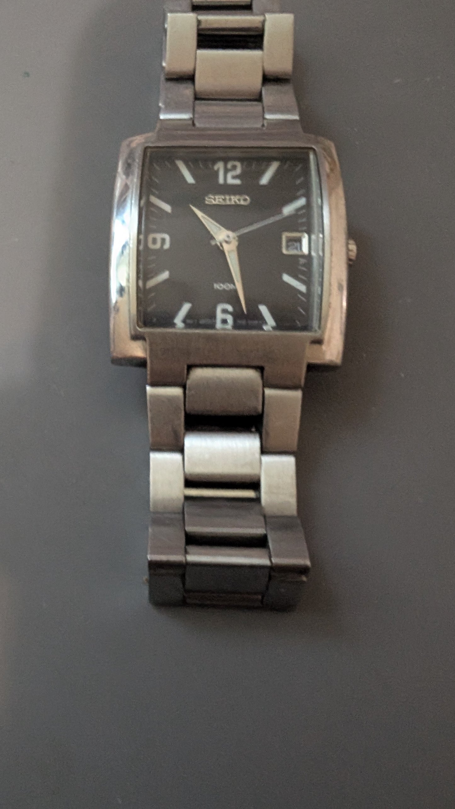 Seiko Spirit tank style quartz watch with new battery and original bracelet. Band. Keeps good time.