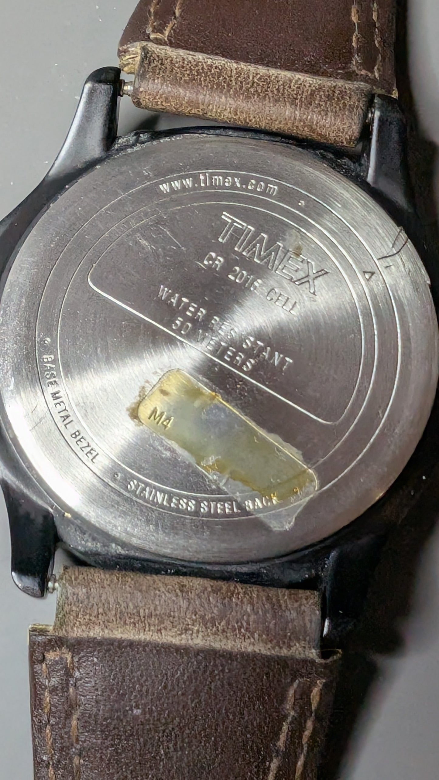 Timex Expedition Indiglo quartz watch with new battery and original leather band. Clean watch that keeps good time.