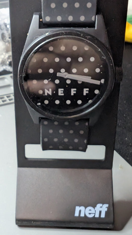Neff Daily Quartz watch with new battery and original packaging. Black with white dots. Perfect, condition. Keeps good time.